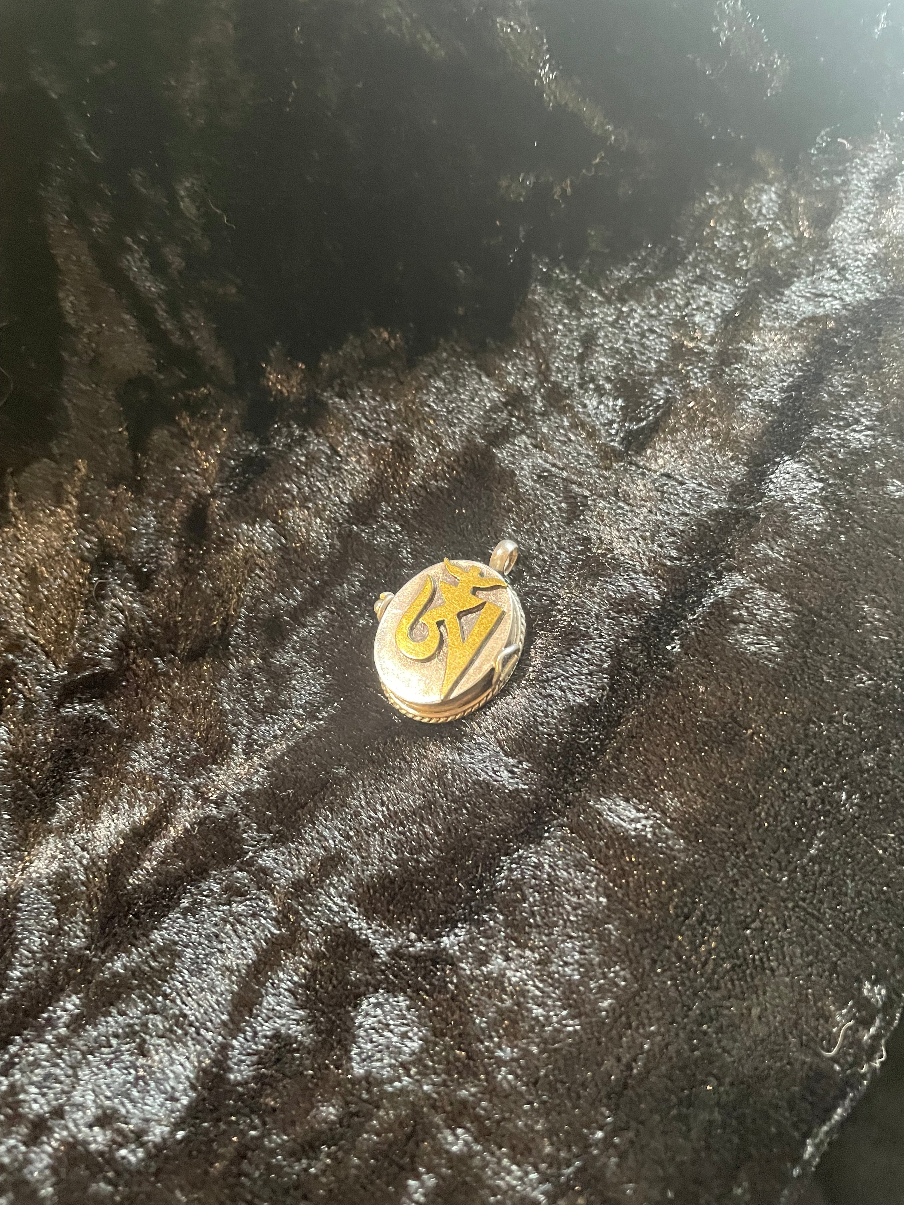 Small Sterling Silver Locket with Gold Embossed Aum
